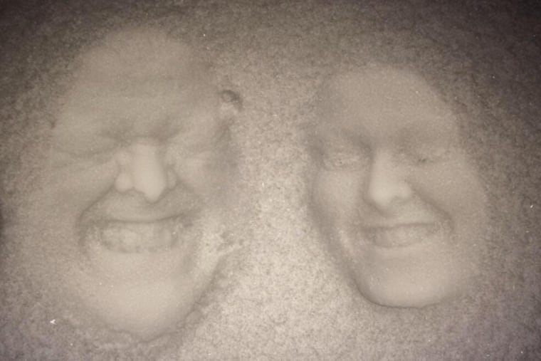 Hillary Jones and her father, Nelson, planted their faces in a layer of snow atop a car, and her photo looked surprisingly three-dimensional. (Courtesy Fox5 Washington)