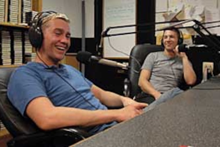 Joseph Tittel, left, with his jmanager, Bob Breining, takes phone calls on his weekly radio show at WBCB. (Jonathan Wilson/Inquirer)