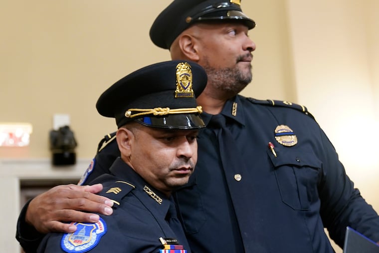 U.S. Capitol Police Sgts. Aquilino Gonell (left) and Harry Dunn, who fought with insurrectionists on Jan. 6, 2021, have since left the force and gone on the road to remind Americans about what they endured at the hands of Trump supporters.