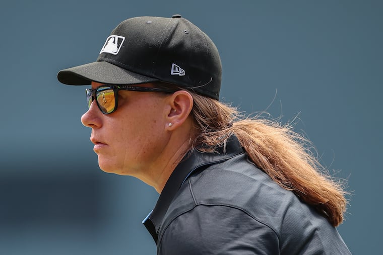 Umpire Jen Pawol looks on during the first inning of a Braves-Marlins doubleheader on Saturday in Atlanta.
