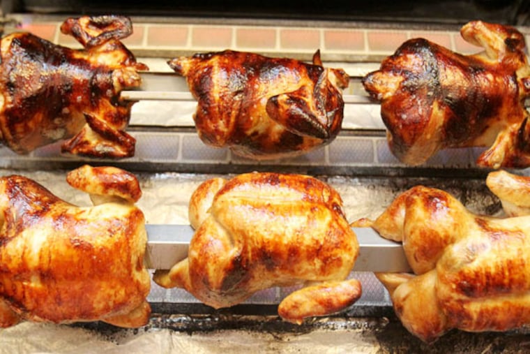 Spit-roasted chickens at Rotisseur - $17 apiece, and primo. CHARLES FOX / Staff Photographer