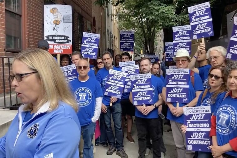 Ellen Trainer, president of Local 77, American Federation of Musicians, and members of the Philadelphia Orchestra speak to the news media before leaving town for concerts in North Carolina, Sept. 19, 2023.