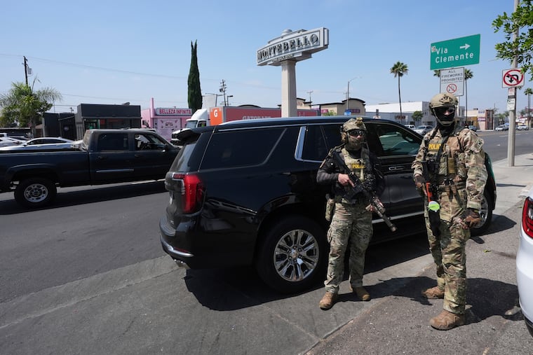 Immigration and Customs Enforcement agents conduct an operation at a car wash, Aug. 15, 2025, in Montebello, Calif.