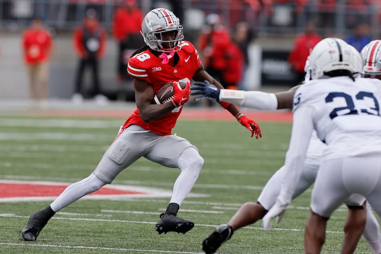 Ohio State receiver Marvin Harrison finished with a game-high 162 yards receiving on 11 catches and the game-clinching touchdown to lead the No. 3 Buckeyes past Penn State.