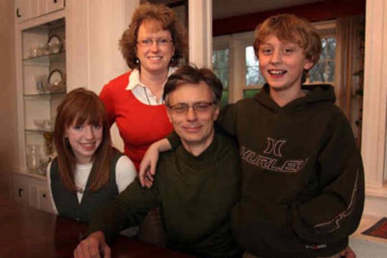 The Slimon family of Paoli: Ian and Lauren with children Emilia and James. Ian helped start an unemployment support group.
