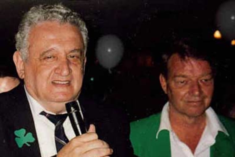 Lifetime Phillies fan and longtime team employee Jerry Politano (left) sings with Harry Kalas at a Clearwater, Fla. karaoke bar last year. (Family photo)