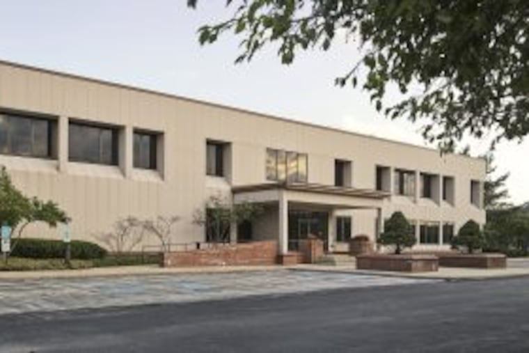 The former home of Rhone-Poulenc Rorer Group in Fort Washington has been purchased by Upper Dublin Township, which plans to convert it into a library.