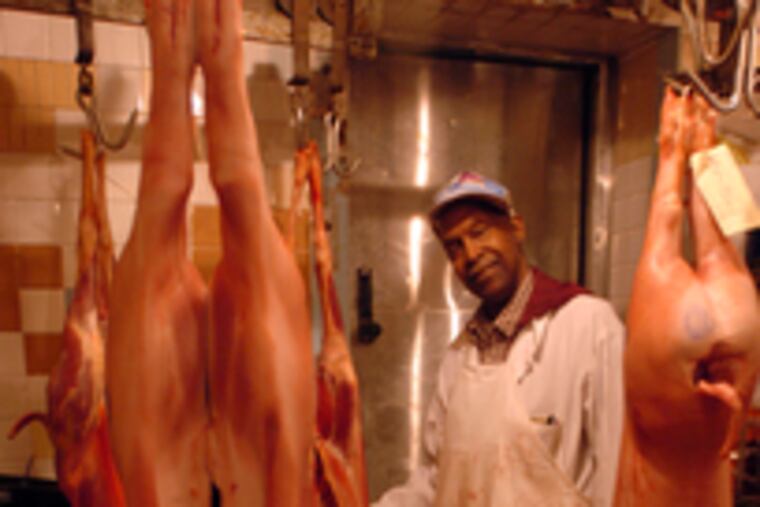 Butcher Bob Fisher at Cannuli Brothers House of Pork in the Italian Market.