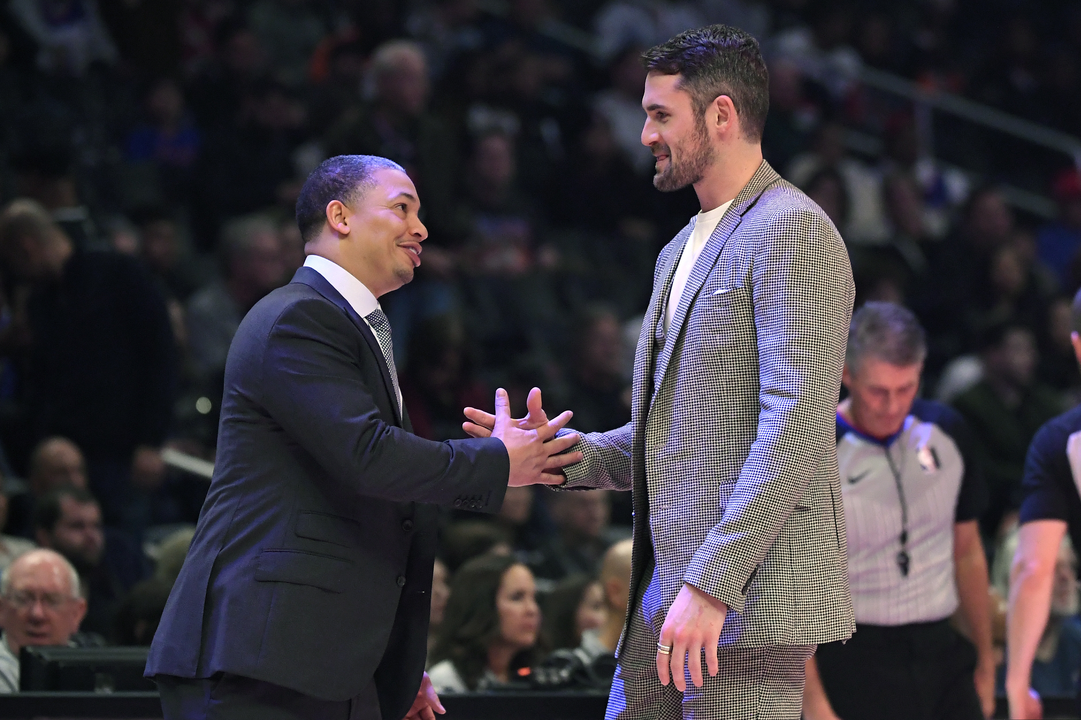 Clippers assistant coach Ty Lue (left) greets Cavaliers forward Kevin Love at a game last season. Would Lue be a good fit to coach the Sixers?