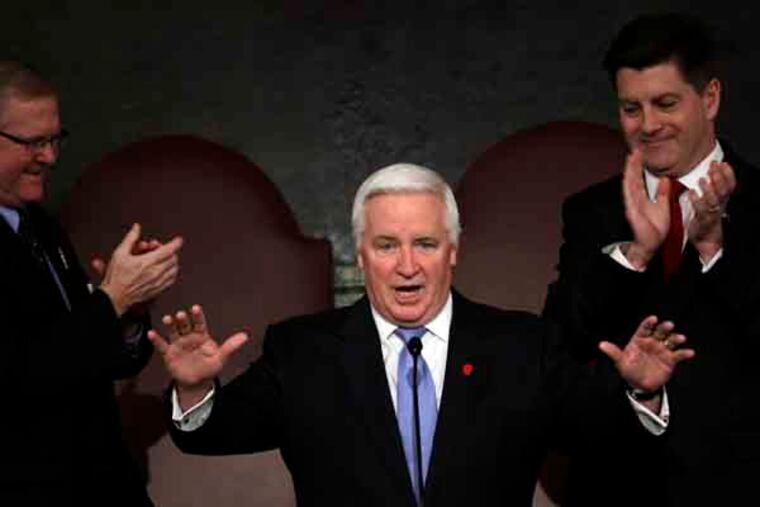 Gov. Tom Corbett gestures as he is applauded at a joint session of the Pennsylvania House and Senate on Tuesday, Feb. 5, 2013, in Harrisburg, Pa. during the state budget address. Pennsylvania Lt. Gov. Jim Cawley is seen on right, and Speaker of the Pennsylvania House of Representatives, Rep. Sam Smith, R-Jefferson, is seen on left. (AP Photo/Matt Rourke)