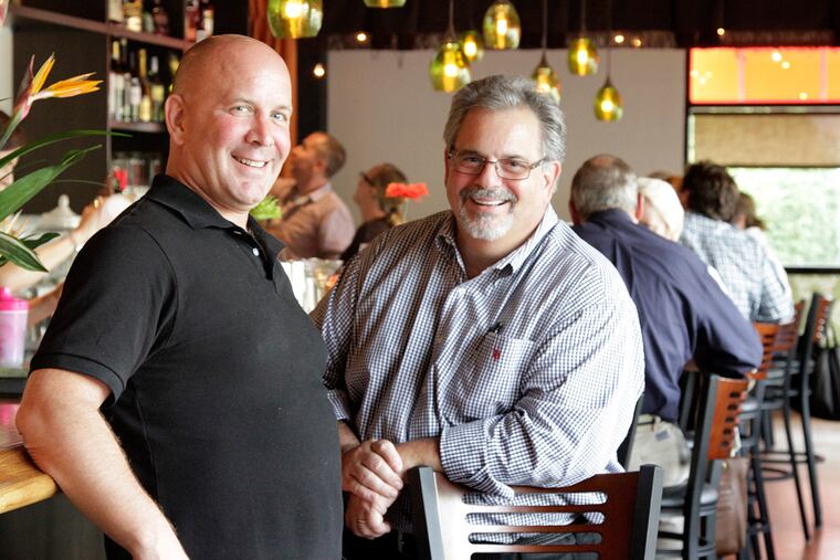 Scott Morrison (left) and business partner Vince Schiavone at Avero, a pizzeria they operated in Devon from June 2013 until its closing in August 2015.