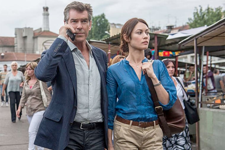 Pierce Brosnan and Olga Kurylenko star in "November Man," which opens Wednesday. (Aleksandar Letic/Relativity Media)