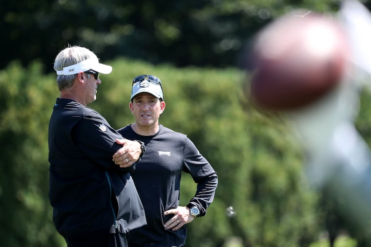 Eagles head coach Doug Pederson, left, and general manager Howie Roseman during Eagles training camp.
