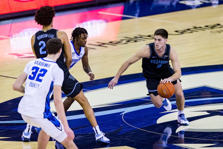 Villanova guard Collin Gillespie drives against Creighton guard Shereef Mitchell (4).