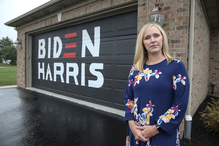 Vandals kept stealing the Joe Biden signs outside Sonja Bihary's home in rural Blair County in west-central Pennsylvania, so she turned her garage door into a campaign billboard.