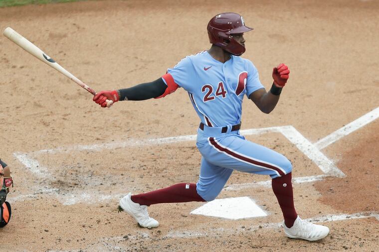 Phillies center fielder Roman Quinn stayed home from Citizens Bank Park on Sunday after experiencing minor symptoms that could be related to COVID-19.