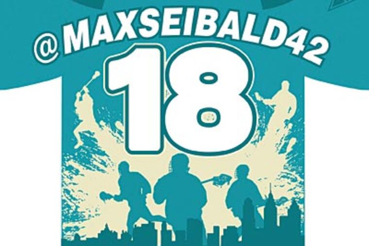 Illustration of a Wings jersey using a Twitter handle instead of a
last name.