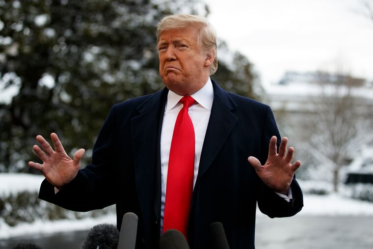 President Donald Trump talks with reporters on the South Lawn of the White House before departing for the American Farm Bureau Federation's 100th Annual Convention in New Orleans, Monday, Jan. 14, 2019, in Washington. (AP Photo/ Evan Vucci)