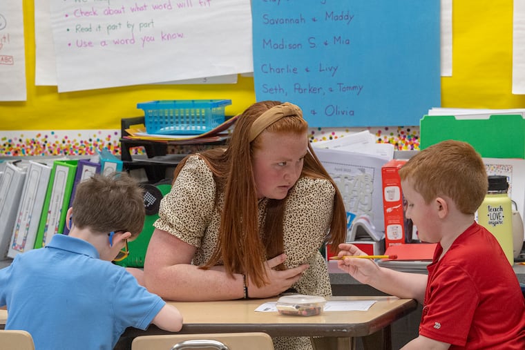 An East Stroudsburg University student teaches at Pleasant Valley Elementary April 12, 2022, as part of a program to address the teacher shortage. To combat the waning pipeline of new teachers, Pennsylvania lawmakers are now proposing to pay student teachers a $10,000 stipend — addressing one barrier to entry into the profession.