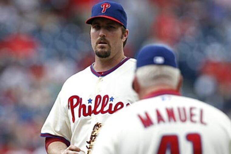 Chad Qualls allowed four runs on five hits during the Phillies' loss to the Dodgers on Thursday. (David Maialetti/Staff Photographer)