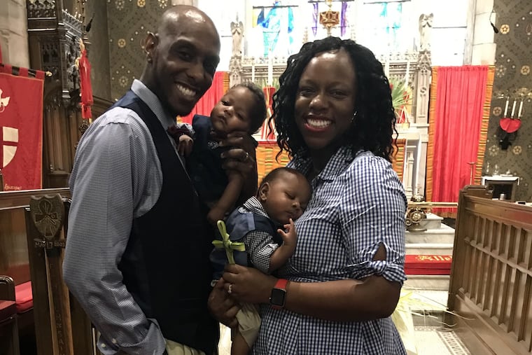 Justin (holding Axel) and Lee Anne (holding Addison).