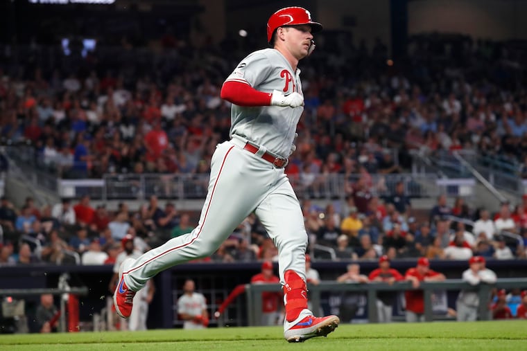 Rhys Hoskins makes his way around the bases after hitting a two-run home run in the fourth inning of the Phillies' win over the Braves Tuesday night.