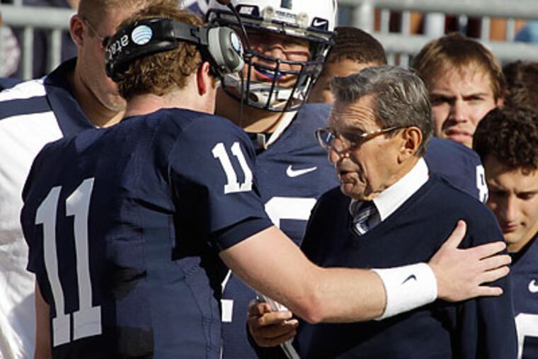 Matt McGloin (left) appears to have opened up an advantage over Rob Bolden in the last three weeks. (Gene Puskar/AP)