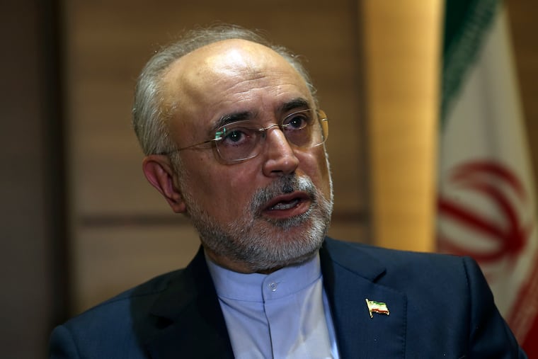 FILE - In this Sept. 11, 2018 file photo, Iran's nuclear chief Ali Akbar Salehi speaks in an interview with The Associated Press at the headquarters of Iran's atomic energy agency, in Tehran, Iran. Salehi told Iranian state television on Sunday, Jan. 13, 2019 that the Islamic Republic has begun "preliminary activities for designing" a modern process for 20-percent uranium enrichment for its 50-year-old research reactor in Tehran, signaling new danger for the nuclear deal. (AP Photo/Vahid Salemi, File)