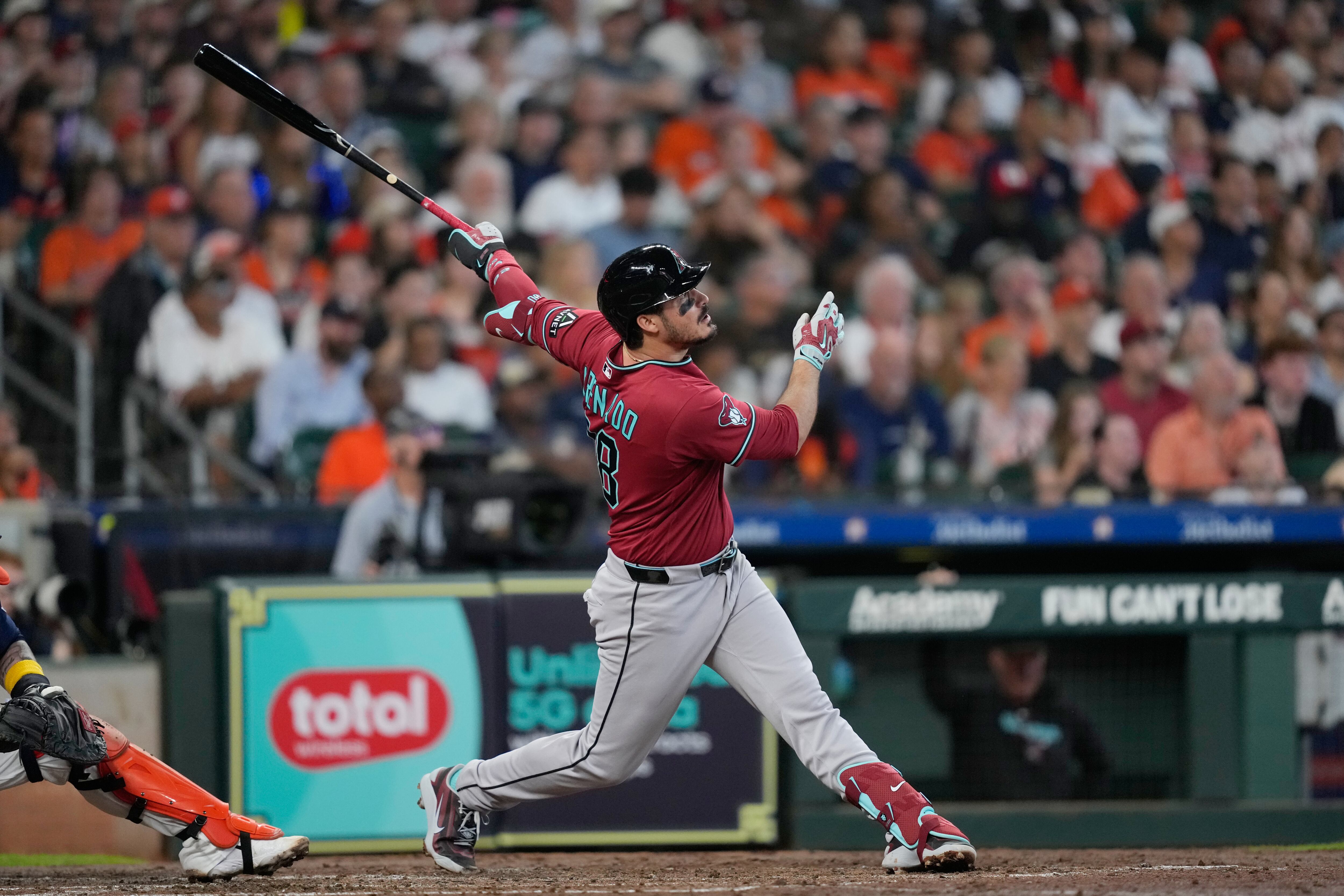 Nolan Arenado’s 2-run homer lifts the Diamondbacks past the Astros 3-2
