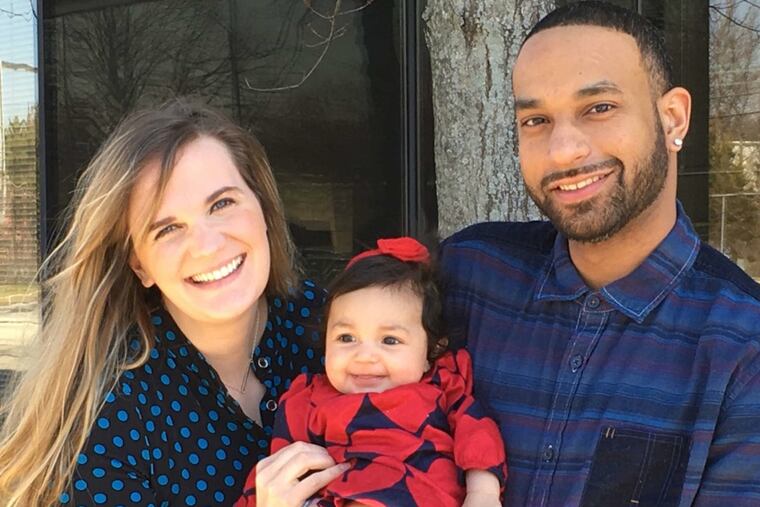 Allison Constable, Marcus Richie, and their daughter, Isabelle.