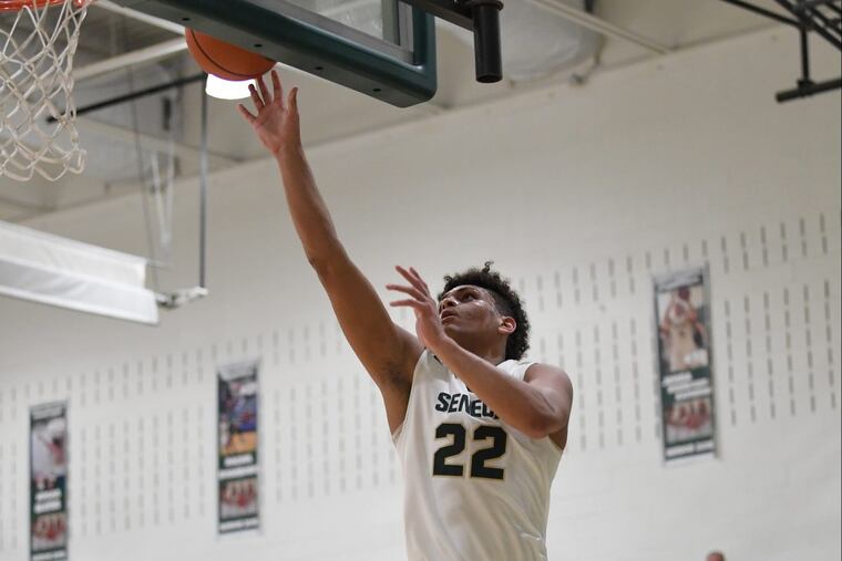 Seneca’s Mike Ginyard, takes the ball to the basket against Triton during the fourth quarter of the South Jersey Group 3 tournament first round game. Seneca won, 51-45.