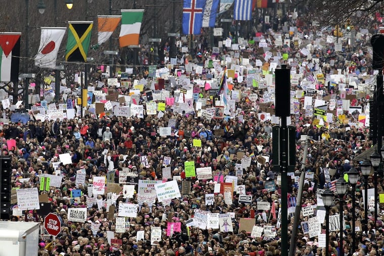 Thousands of protesters fill the Benjamin Franklin Parkway in Philadelphia as they participate in a Women’s March Saturday January 21, 2017.