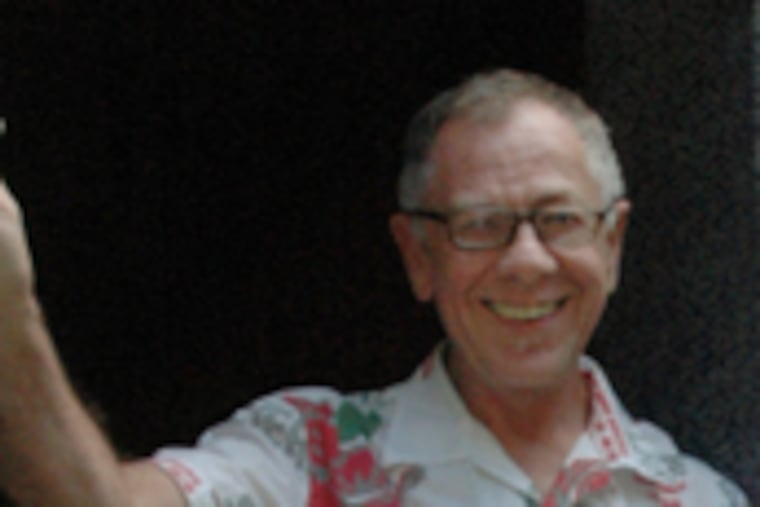 Reed Apaghian stands in the window of Astral Plane, a restaurant he opened at 17th and Lombard Streets in 1973. Yesterday's final brunch brought out a nostalgic crowd of devoted regulars to bid farewell.