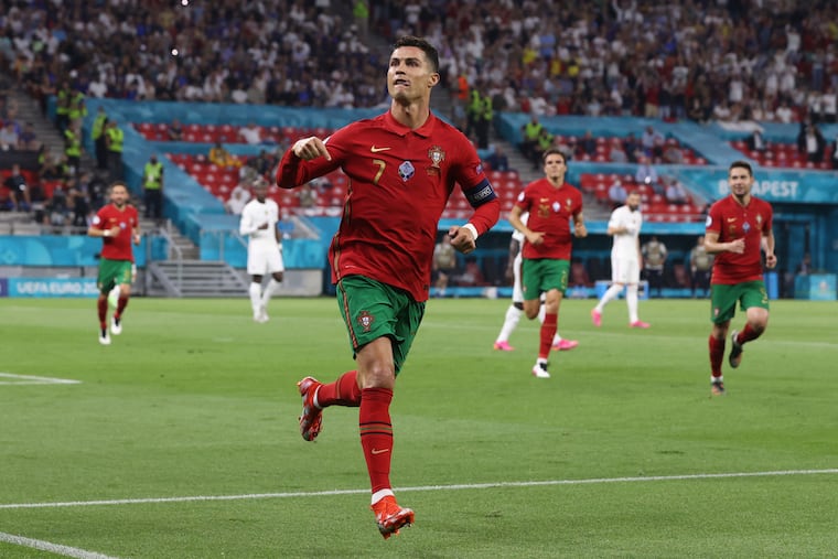 Cristiano Ronaldo scored both goals in Portugal's 2-2 tie with France that clinched a berth in the European Championship's round of 16.