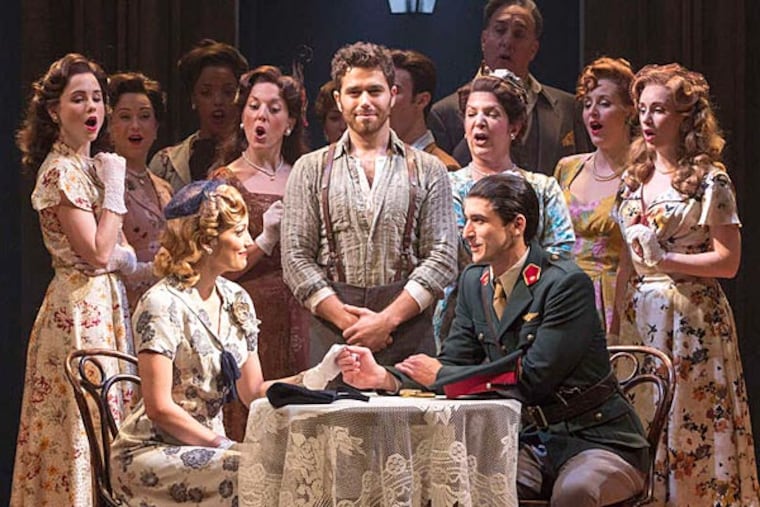 "Evita" stars Caroline Bowman, Josh Young as Che (center), and Sean MacLaughlin as Juan Peron. (RICHARD TERMINE)