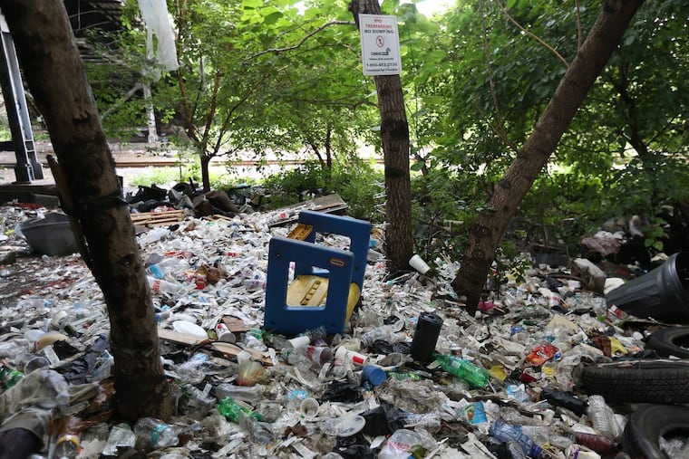 Trash covers the area around the Conrail tracks at Second and Indiana.