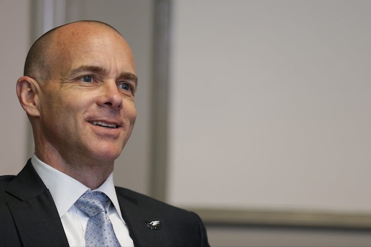 Eagles president Don Smolenski talks with reporters before the team received the John Wanamaker Athletic Award.