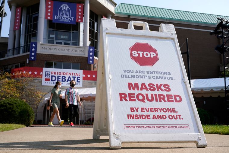 This sign greeted visitors outside the Curb Event Center at Belmont University as preparations took place for the second Presidential debate on Oct. 20 in Nashville, Tenn.,
Governors of states including Tennessee, Oklahoma, Nebraska and North Dakota are all facing calls from doctors and public health officials to require masks. (AP Photo/Patrick Semansky)