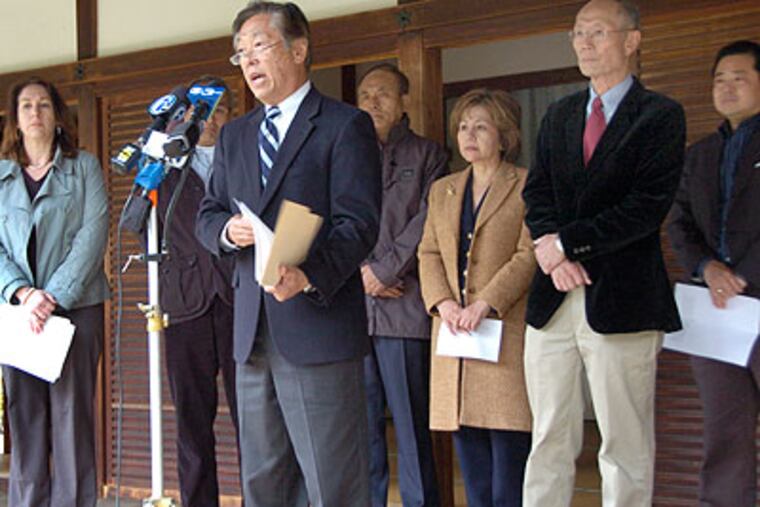 Honorary Consul General of Japan Dennis Morikawa discusses the most recent updates from Tokyo at the Japanese House and Garden in Fairmount Park on Friday. (Maria Pouchnikova / Staff Photographer)