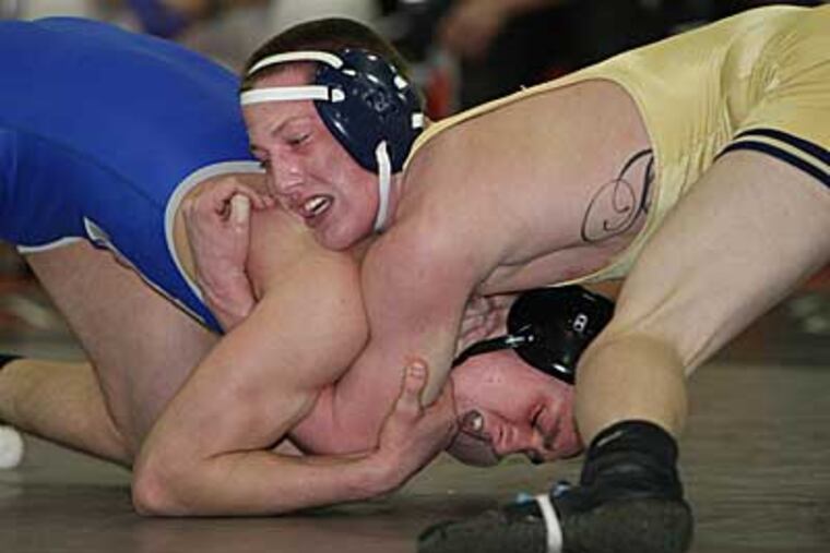 On Feb. 11, Eric Hamrick (right) won the Region 7 140-pound title. (Michael Bryant/Staff File Photo)