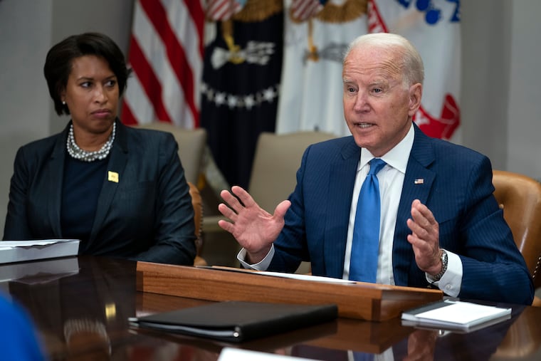 Washington Mayor Muriel Bowser listens as President Joe Biden speaks during a meeting on reducing gun violence, in the Roosevelt Room of the White House, in July 2021.