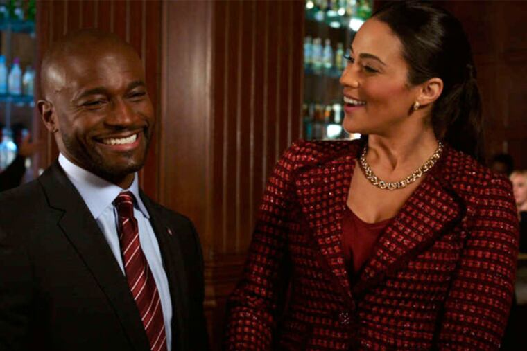 Montana (Paula Patton) is on a mission to get engaged, and Langston (Taye Diggs) is an old flame, in "Baggage Claim." (Fox Searchlight)