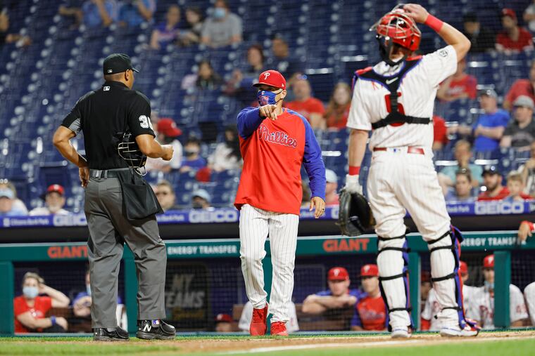 Joe Girardi comes out to argue a play at home in the seventh inning against Miami on Wednesday night.
