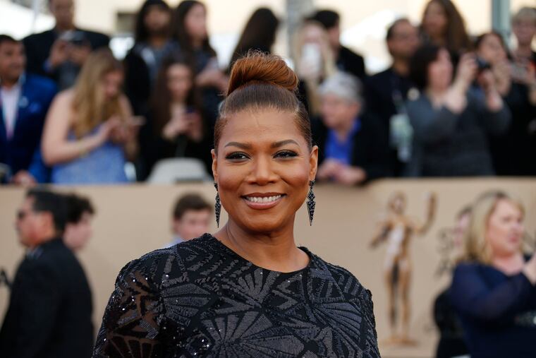 Queen Latifah arrives at the 22nd Annual Screen Actors Guild Awards at the Shrine Auditorium in Los Angeles on Saturday, Jan. 30, 2016.