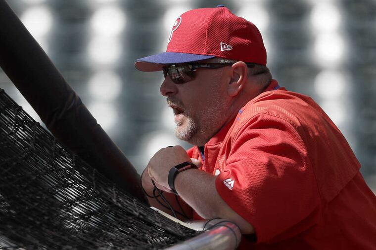 Batting Coach Matt Stairs watches batting practice before the Phillies played the Atlanta Braves in a spring training game on Wednesday, March 8, 2017.