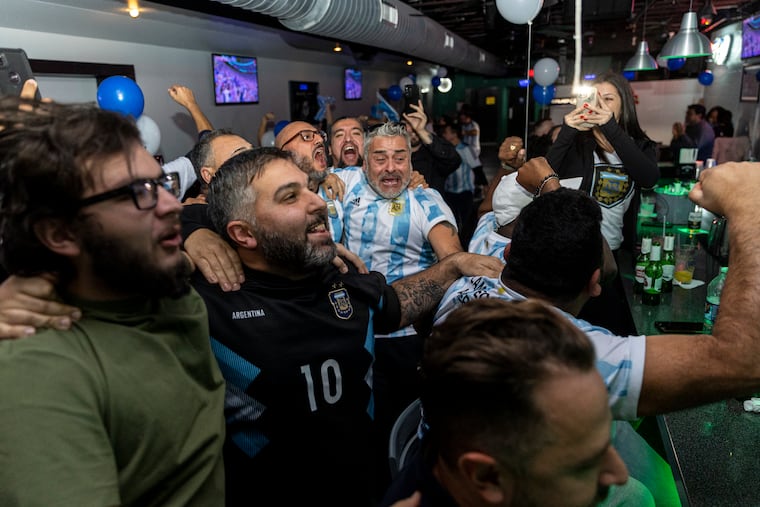 Many fans cheer as Argentina scores their second goal against the Netherlands in the World Cup at Dimension Sports Bar in Philadelphia, Pa., on Friday, Dec. 9, 2022.