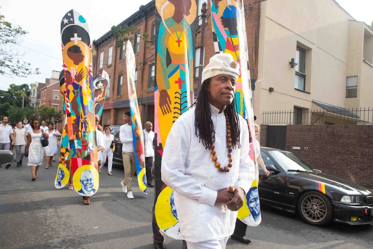 Philadelphia Orchestra composer-in-residence Hannibal Lokumbe leads the “walk of love” from Weccacoe Playground (original burial ground of Mother Bethel) to Mother Bethel Church.
