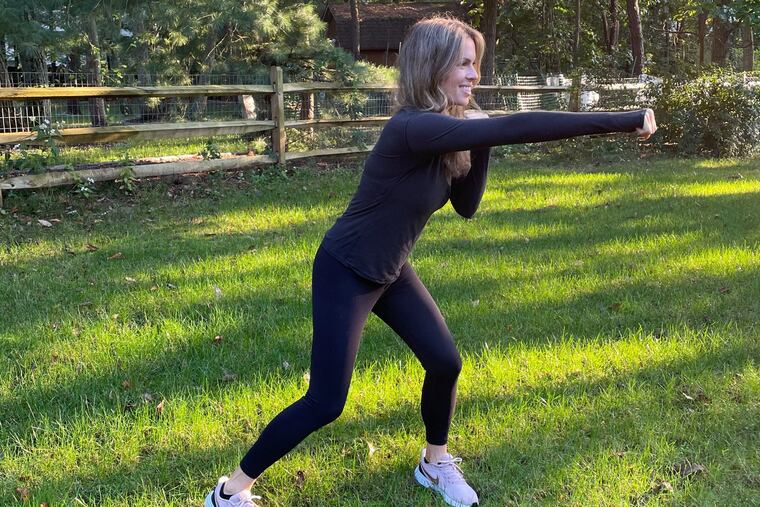 Ashley demonstrates air punches.