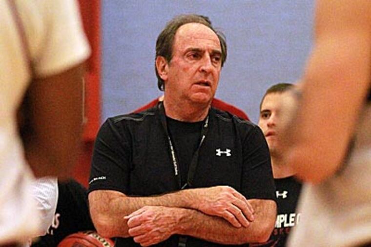 Fran Dunphy watches his team during a practice session. (David Swanson/Staff Photographer)