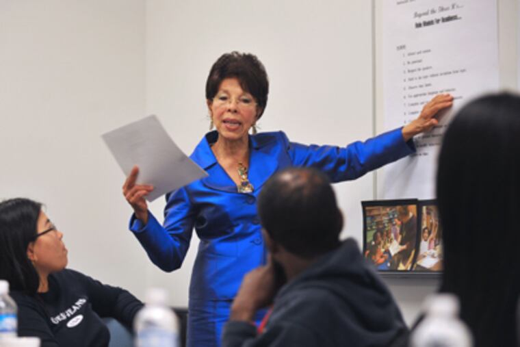 Parent University students (from left) Ekawati Phiong, Dorian Harris, and Kashee Johnson listen to a lesson from Erlene Bass Nelson. (Sharon Gekoski-Kimmel / Staff)